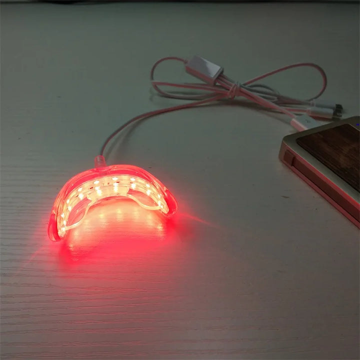 Terapia de luz roja oral para bienestar bucal. Cuidado fácil de encías y boca sana desde el hogar.