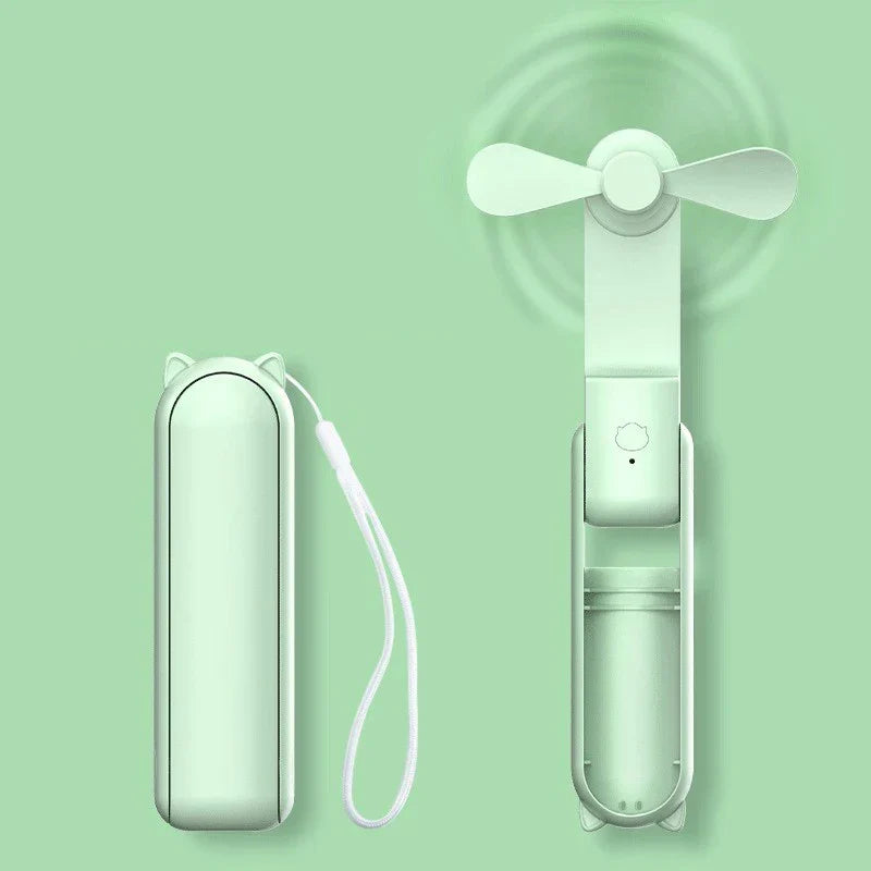 Mini ventilador de mano y mesa, USB recargable, 3 velocidades. Con powerbank para frescor portátil.