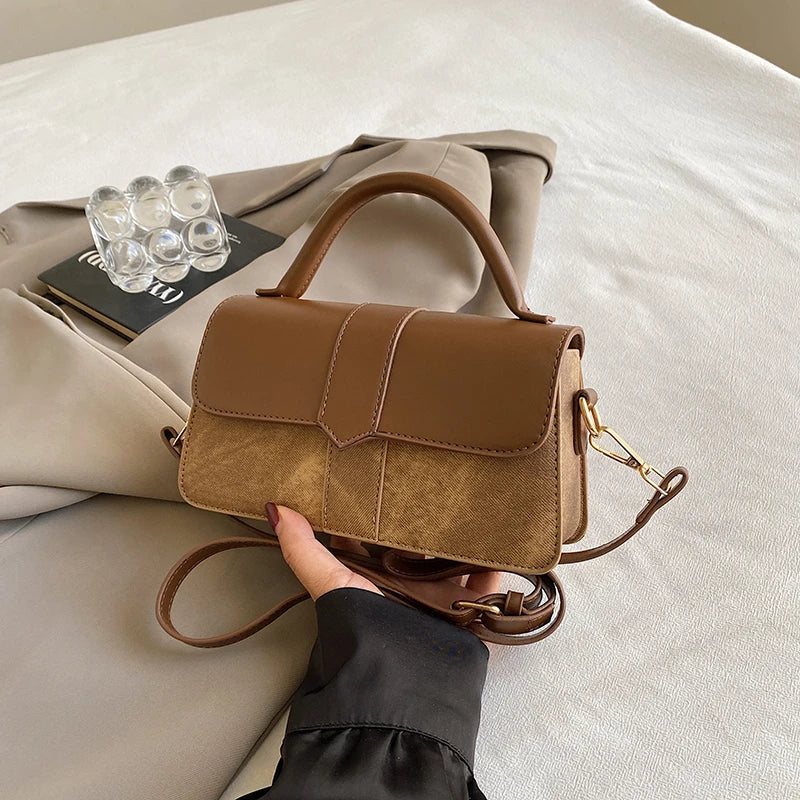 Elegante bolso de mujer con correa de hombro, amplio compartimento, ideal para cualquier estilo.
