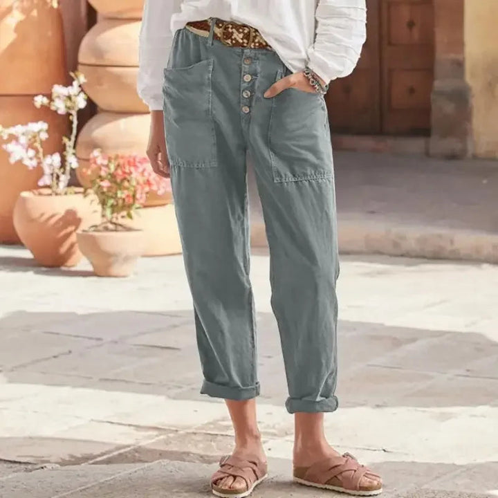 Pantalón de mujer cómodo y elegante, corte relajado, cintura alta que favorece, ideal para días de verano.