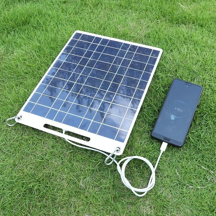 Panel solar portátil de 100W para camping y senderismo, ideal para cargar dispositivos en exteriores.