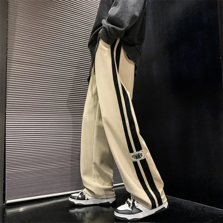 Pantalones anchos de pana para hombre. Disponibles en verde, negro y beige. Comodidad y estilo casual.