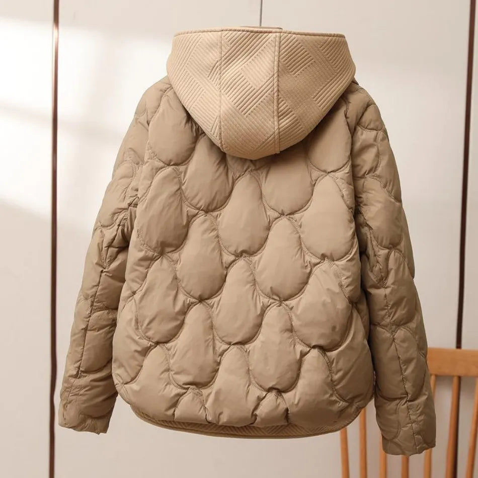 Abrigo de invierno cálido y sofisticado para mujer, ideal para el frío. Confeccionado con tejido de calidad.