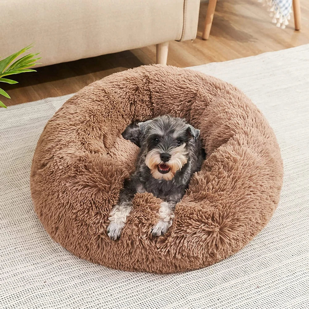 Lujosa cama de peluche redonda para mascotas, muy suave y lavable, perfecta para el descanso de perros y gatos.