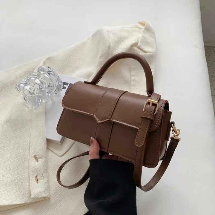 Bolso de hombro versátil para mujer, ideal para trabajo u ocio, un accesorio de moda esencial.