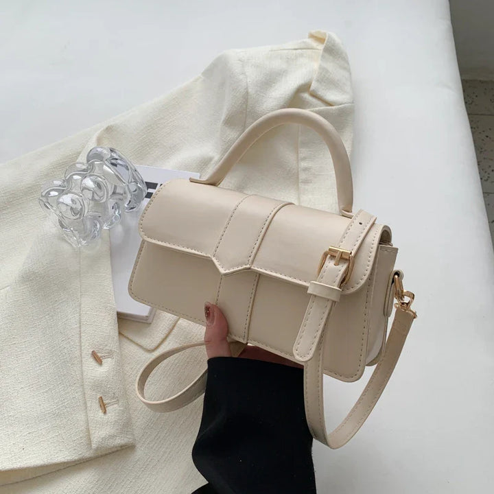 Bolso de hombro para mujer, ideal para llevar tus esenciales con estilo y comodidad, muy versátil.
