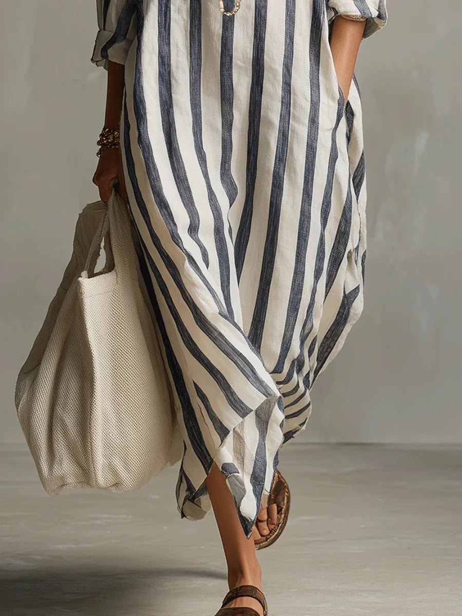 Moda mujer: Vestido camisero largo rayado, de corte fluido, elegante y moderno para cualquier ocasión.