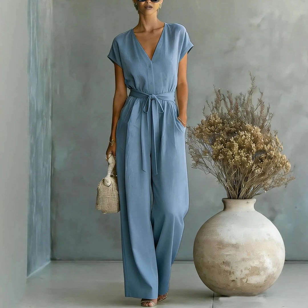 Mono de mujer fluido, escote V y pantalón ancho. Cómodo poliéster, estilo elegante para primavera y verano.