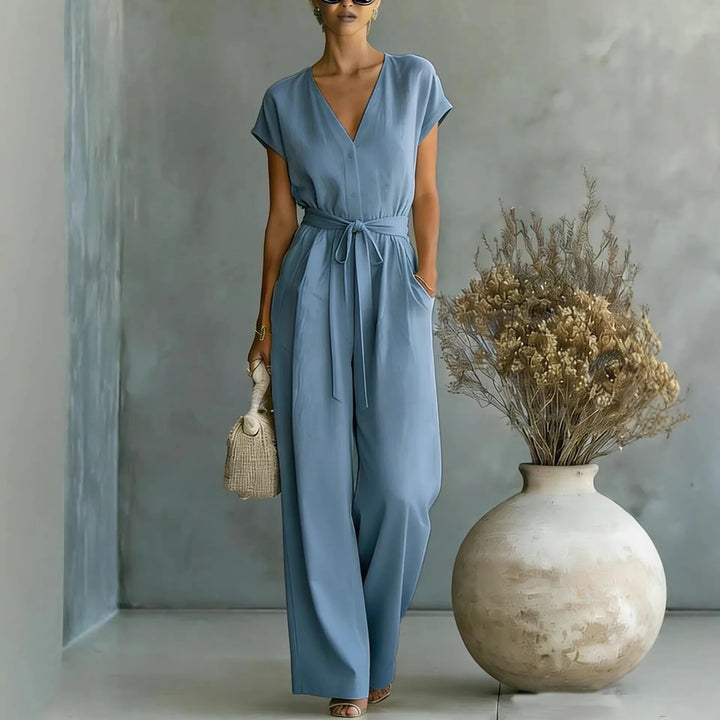 Mono de mujer fluido, escote V y pantalón ancho. Cómodo poliéster, estilo elegante para primavera y verano.