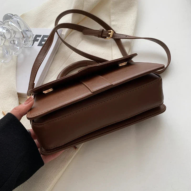 Bolso de moda para mujer, asa ajustable, elegante y versátil, complemento perfecto para tu outfit.
