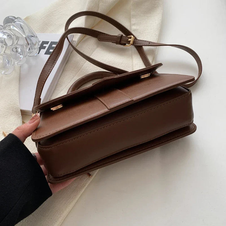 Bolso de moda para mujer, asa ajustable, elegante y versátil, complemento perfecto para tu outfit.