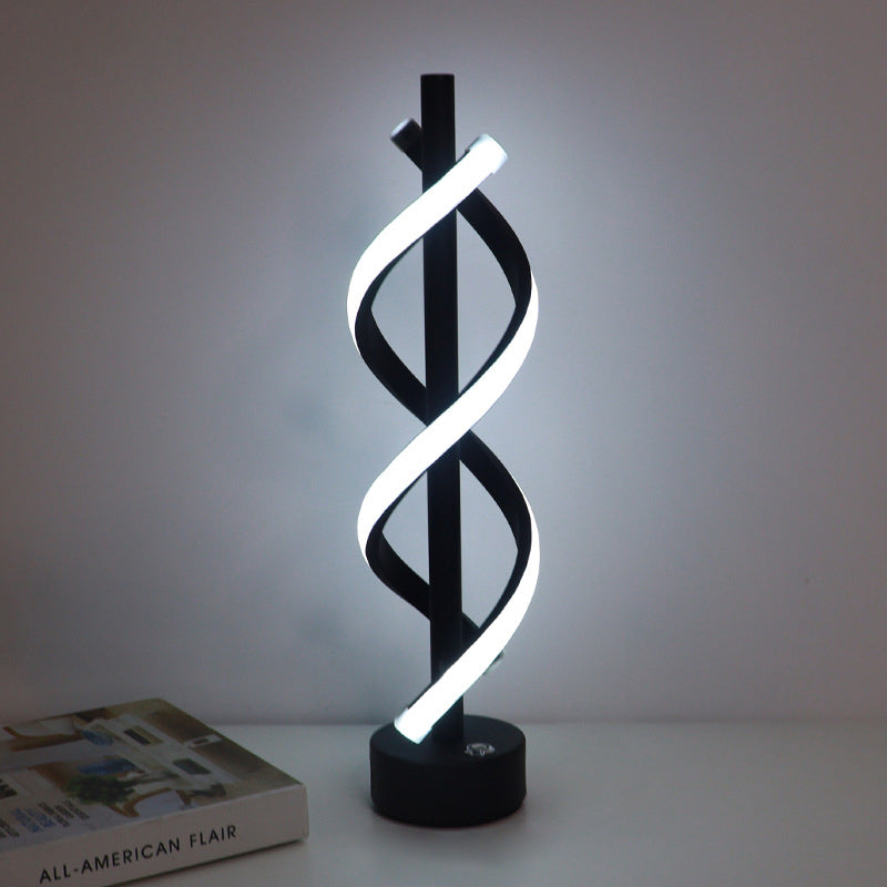 Lámpara LED de mesa con forma espiral. Iluminación moderna de estilo nórdico. Versátil para cualquier cuarto.