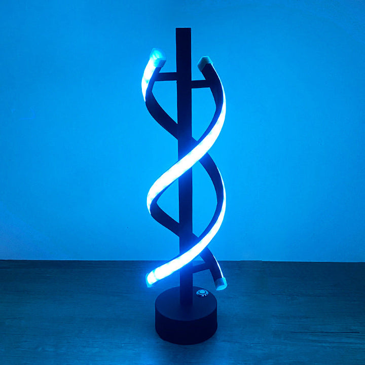 Elegante lámpara LED espiral de mesa. Estilo nórdico moderno. Ideal para iluminación funcional y decorativa.