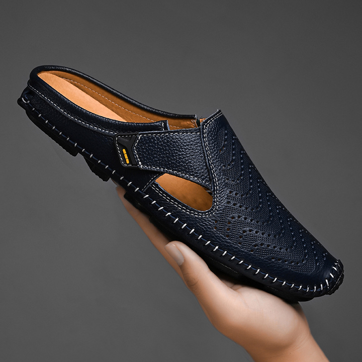 Mules de hombre con laterales abiertos, ideales para confort diario y estilo casual de verano.