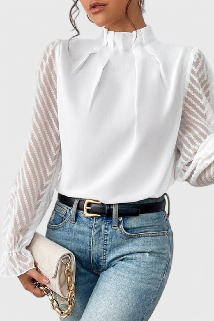 Blusa de mujer, manga larga estilo náutico, pieza clave en moda femenina casual y chic.