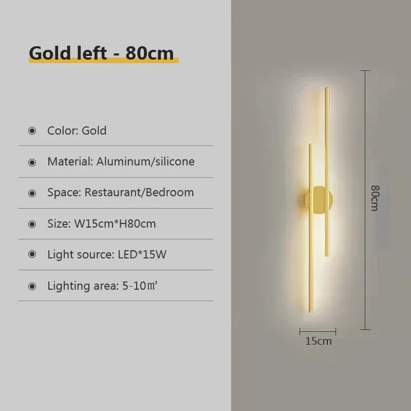Moderna lámpara LED de pared con doble haz de luz. Diseño negro y dorado, perfecta para decoración del hogar.