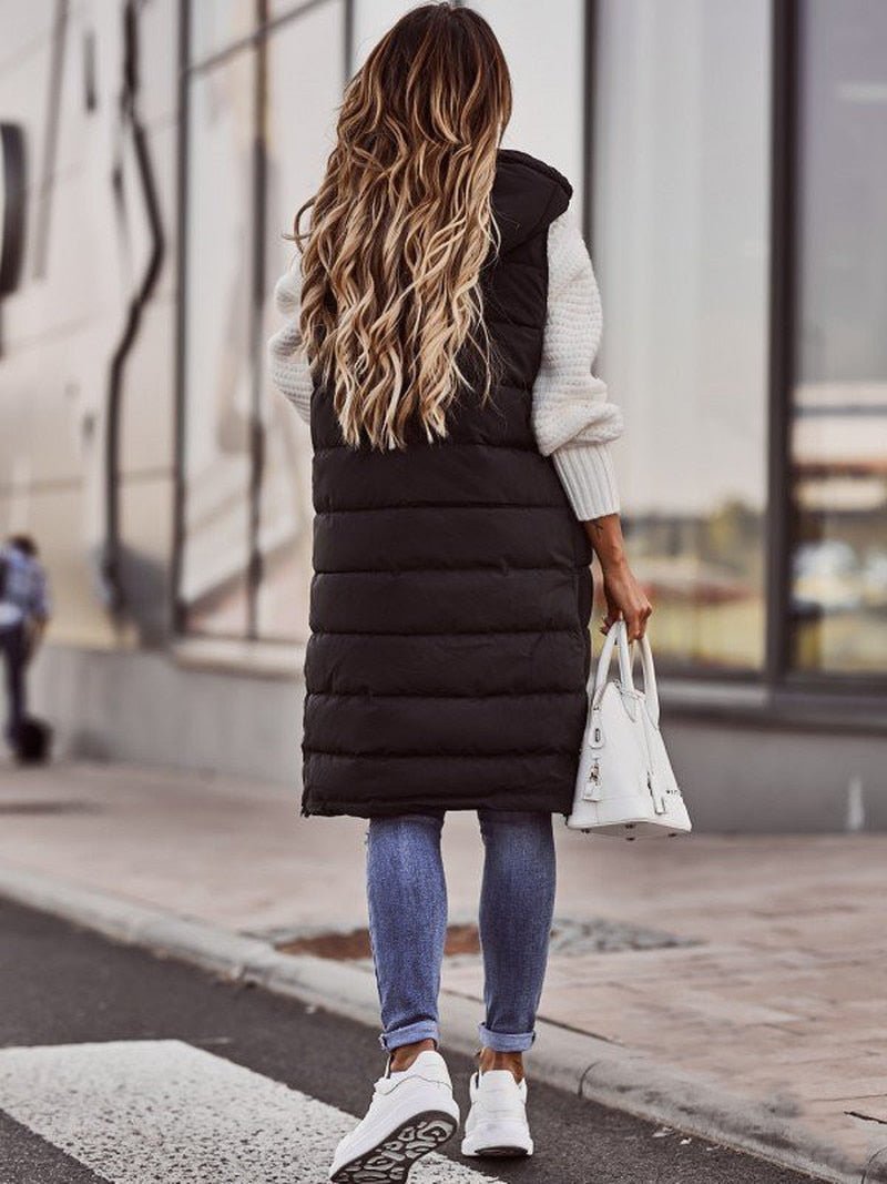 Chaleco de mujer largo acolchado, versátil para capas de otoño e invierno. Estilo moderno, mantiene el calor.
