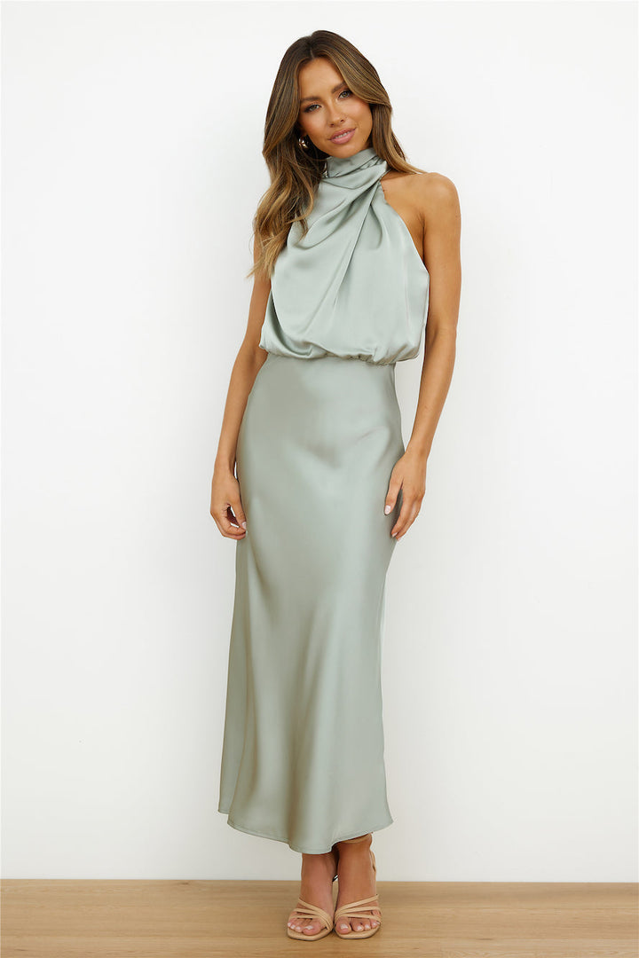 Vestido elegante midi asimétrico Luzielle para mujer. Estilo versátil, apto para fiesta y casual.