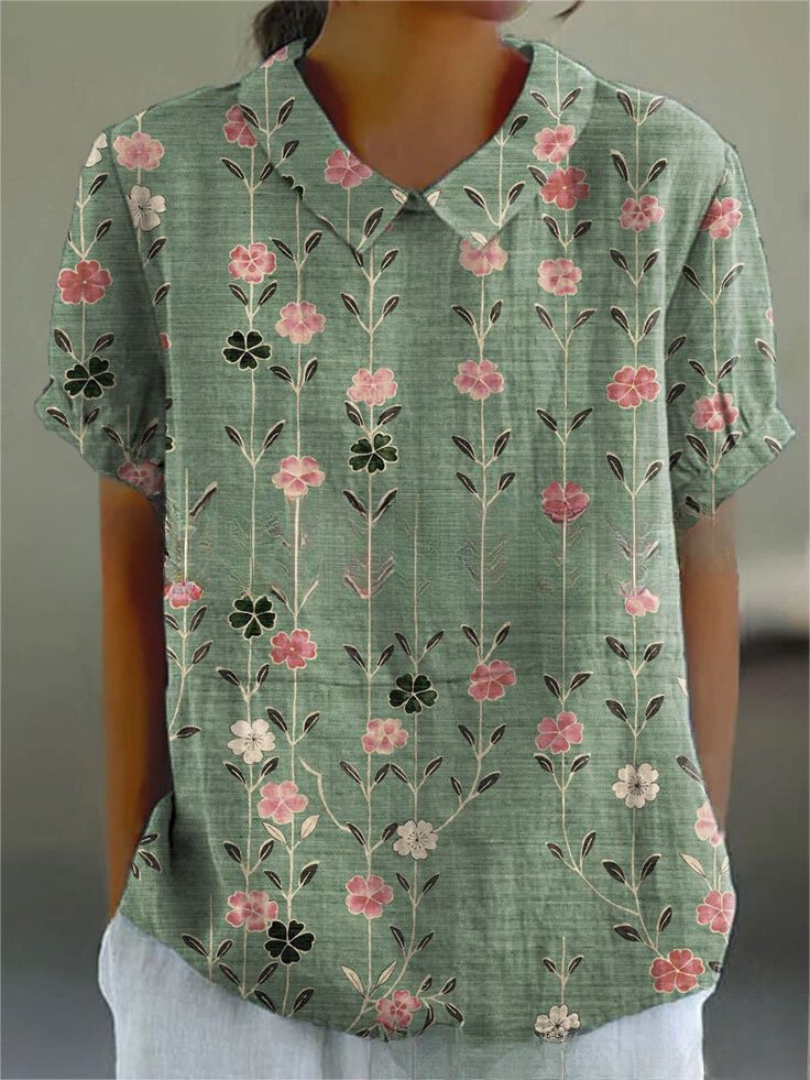 Detalle del cuello camisero en blusa de manga corta para mujer. Bordado delicado, estilo fresco de primavera.