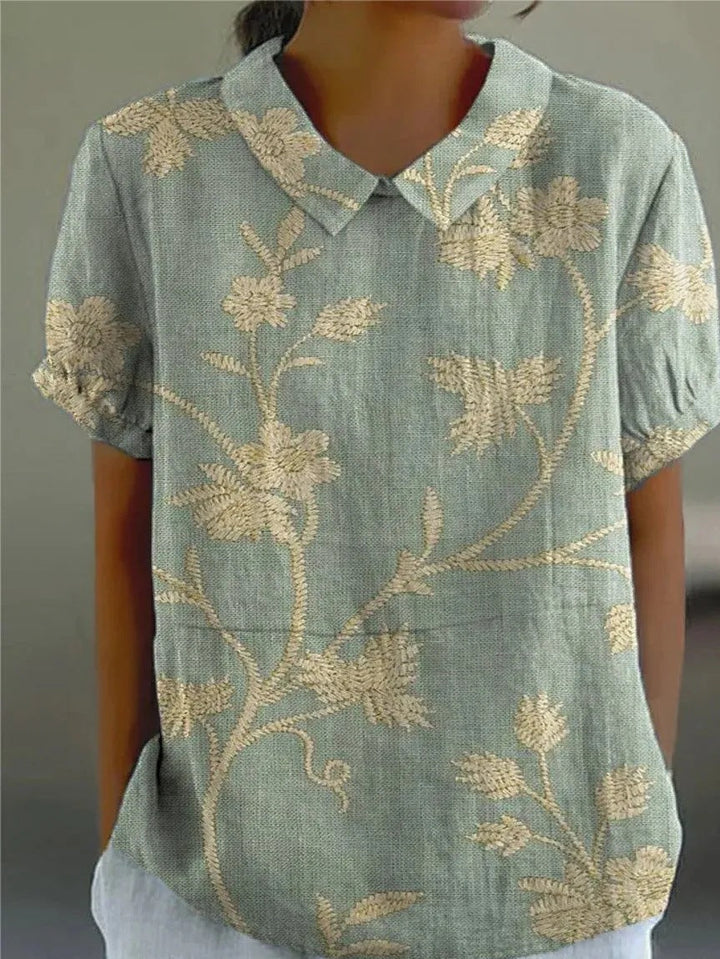 Blusa bordada de manga corta para mujer, estilo casual y fresco. Ideal para primavera y verano, moda femenina.