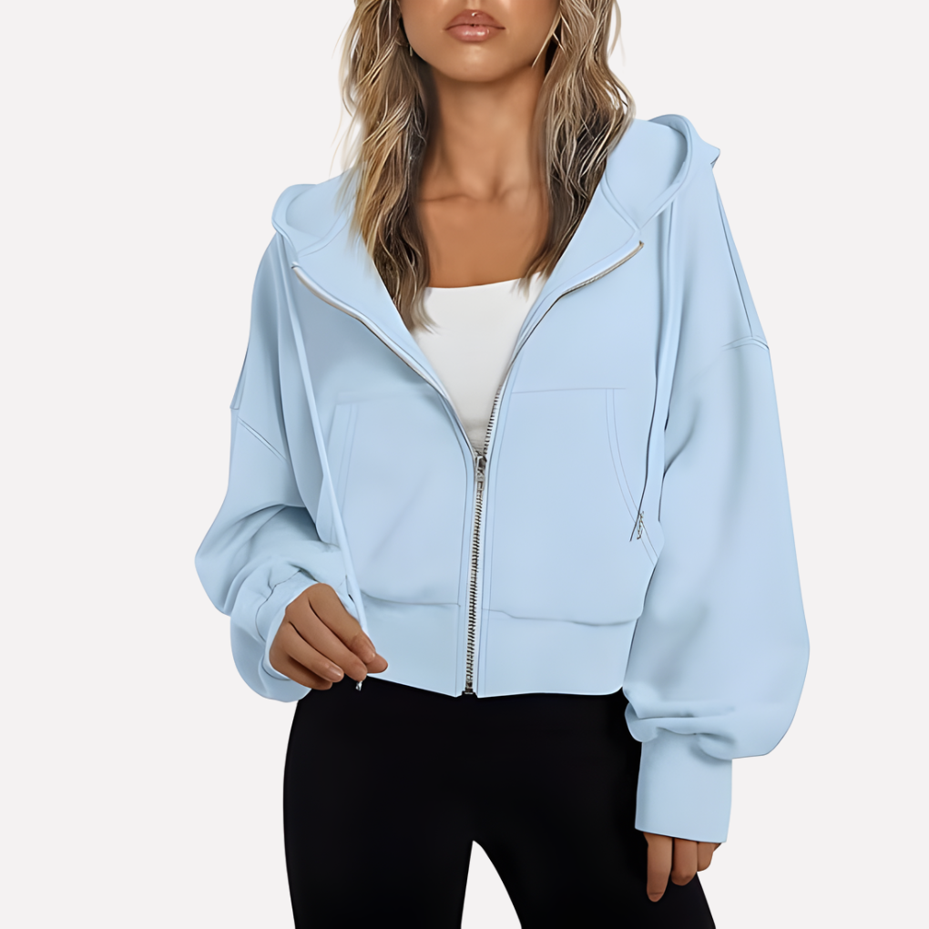 Sudadera de mujer para el día a día, con capucha, cremallera y bolsillos. Un básico cómodo y versátil.