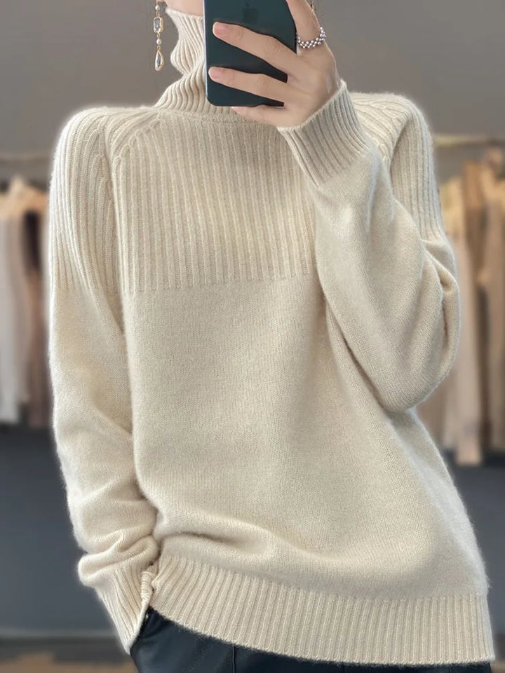 Suéter de mujer de punto con cuello alto, muy cómodo y cálido para las bajas temperaturas.