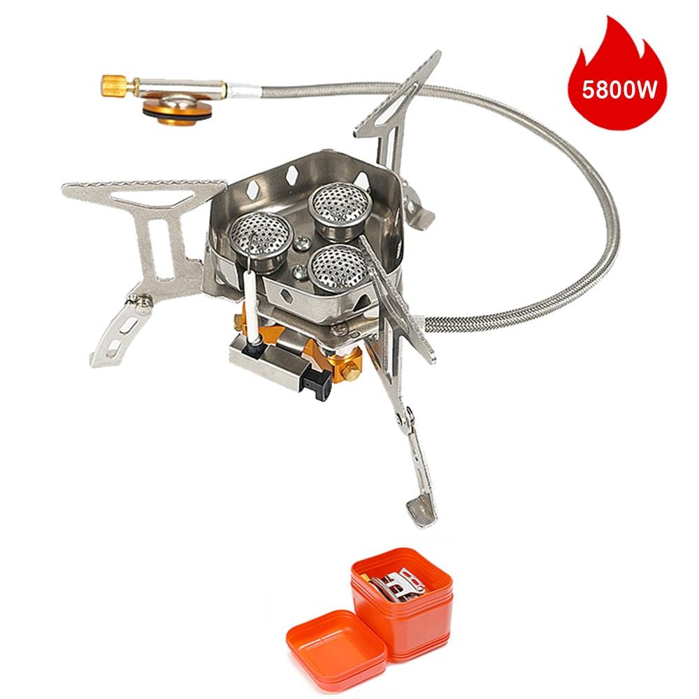 Estufa de gas portátil para camping, compacta y eficiente, ideal para senderismo y aire libre.