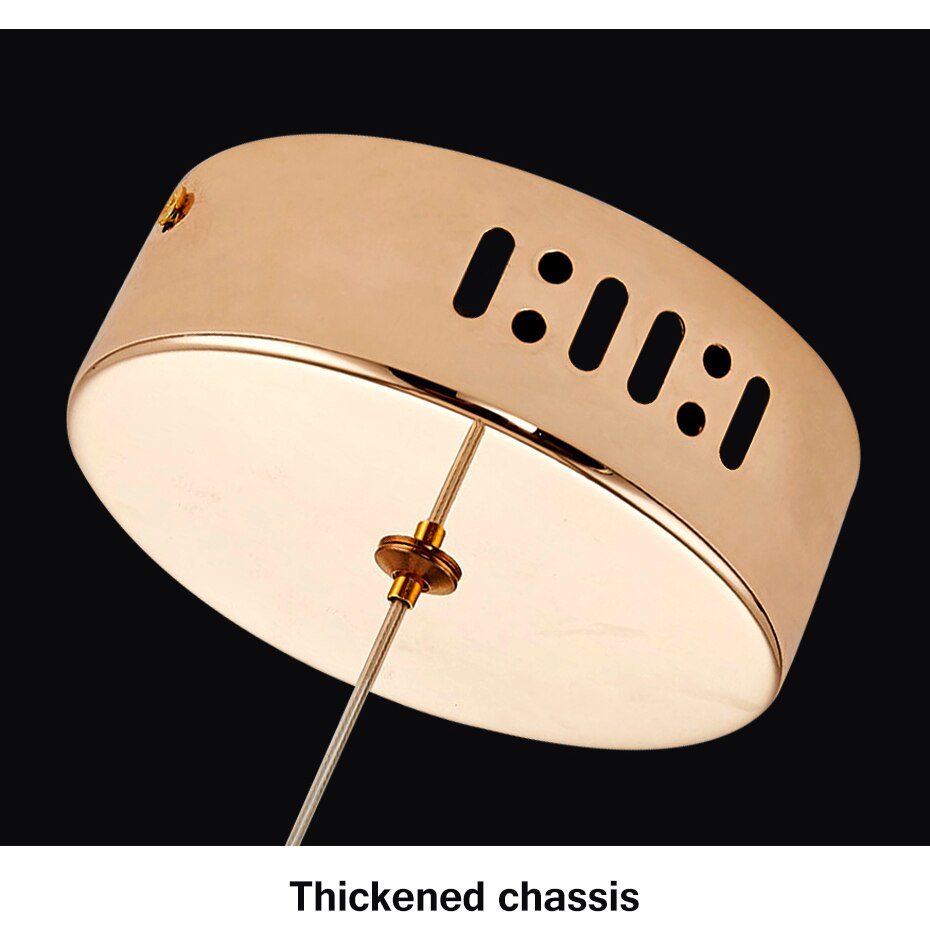 Iluminación LED colgante de cristal y dorado, acento moderno para tu comedor.