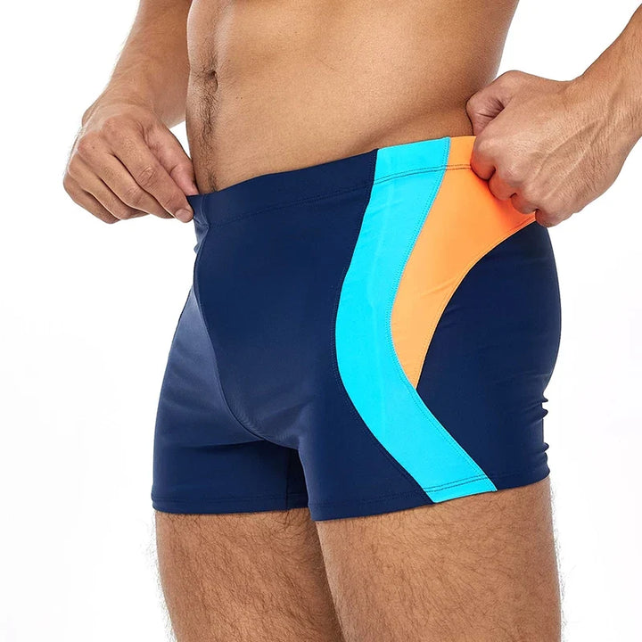 Shorts de baño hombre ajustables y cómodos, perfectos para playa, piscina. Secado rápido.