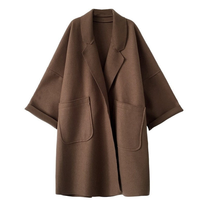 Abrigo largo de mujer, trenchcoat elegante. Perfecto para moda femenina de otoño e invierno, muy versátil.