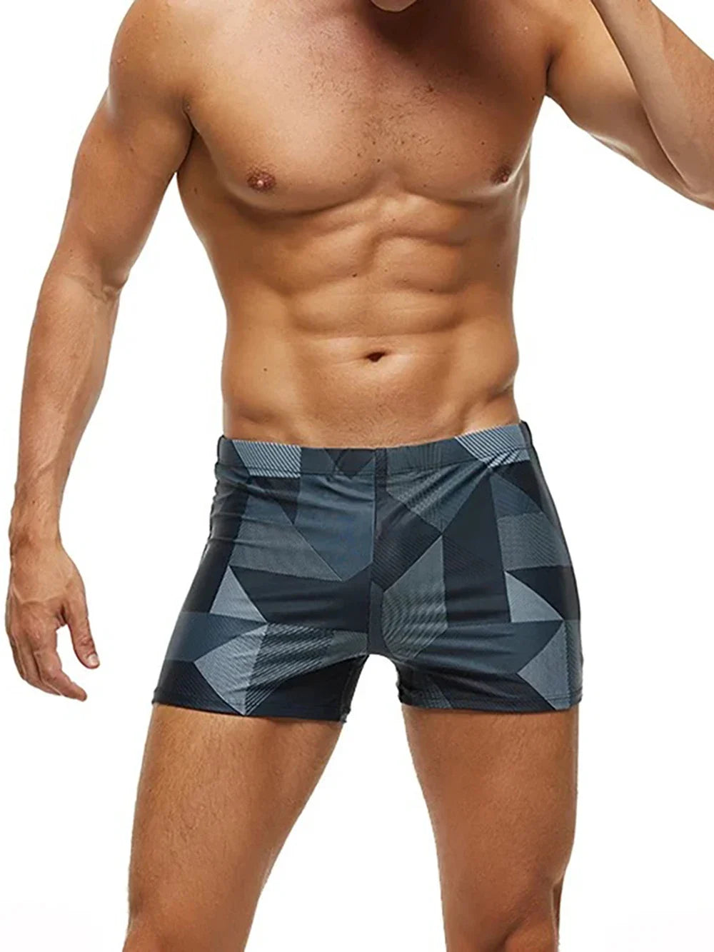 Bañador bóxer geométrico para hombre. Estilo moderno, ideal para la playa, piscina y deportes acuáticos.