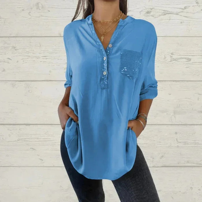 Blusa casual de mujer con detalle de lentejuelas y botones, tendencia de moda femenina.
