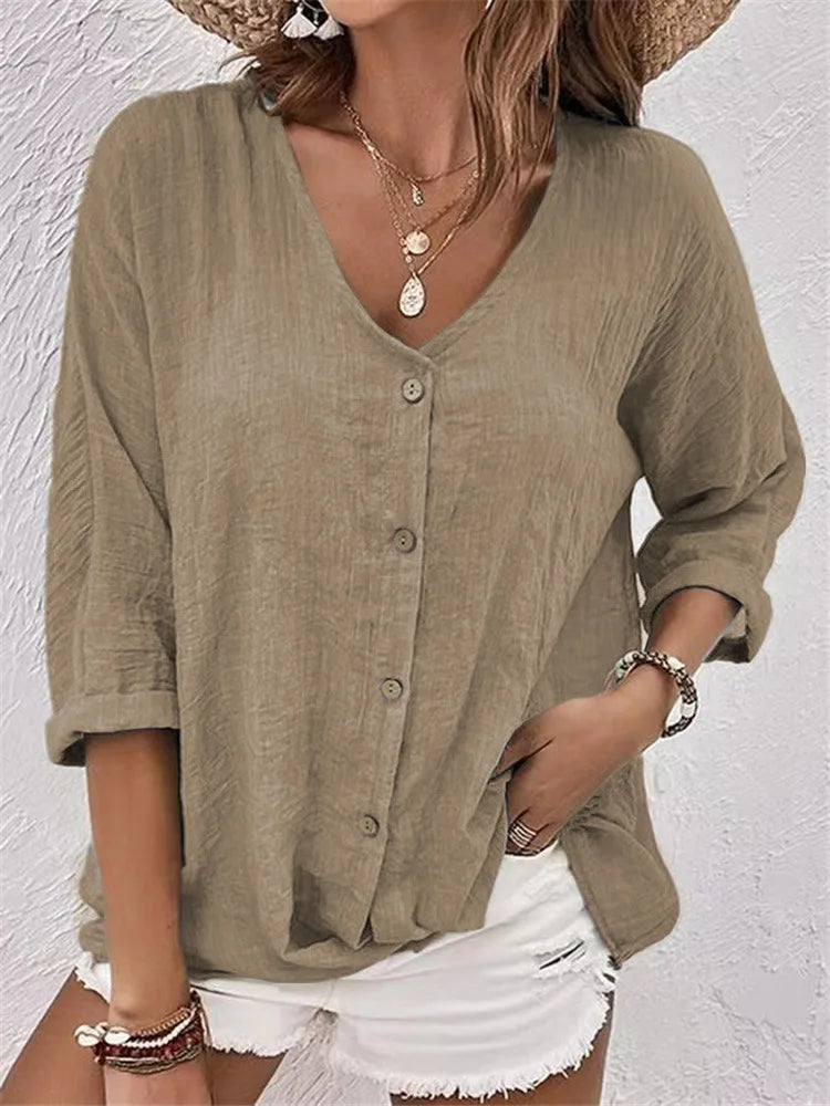 Blusa de mujer fresca y versátil de verano con botones. Estilo casual elegante, manga 3/4 para moda.