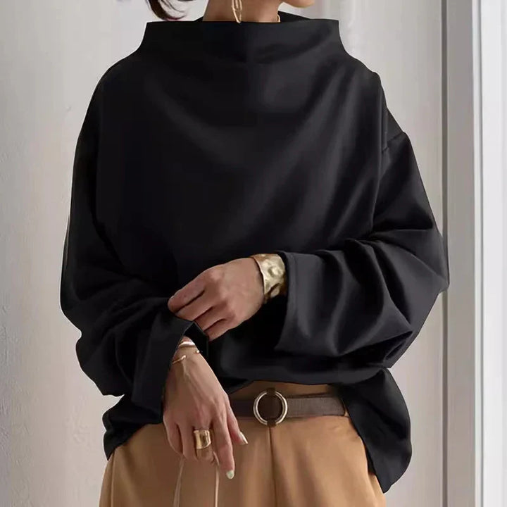 Suéter amplio de mujer con cuello alto, diseño moderno y elegante para moda de invierno. Comodidad.
