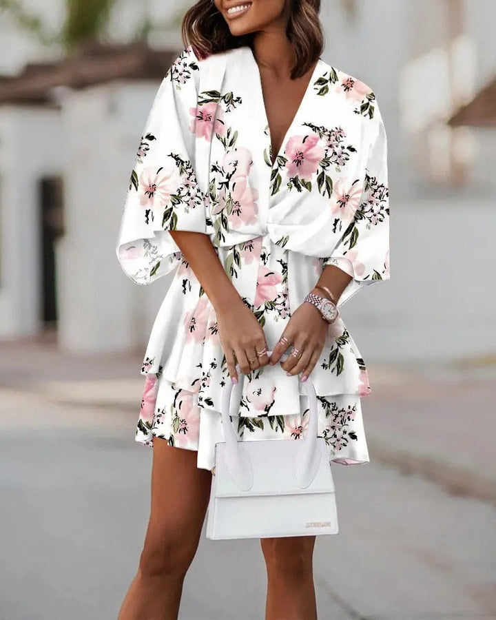 Primaveral vestido mini floral para mujer, escote en V y manga larga, muy chic y versátil.