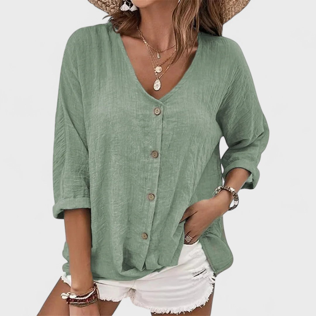Blusa suelta de lino para mujer con escote en V, perfecta para moda de verano casual y cómoda.