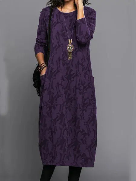 Vestido midi de manga larga para mujer. Estilo fluido que realza la figura, ideal para entretiempo y comodidad.