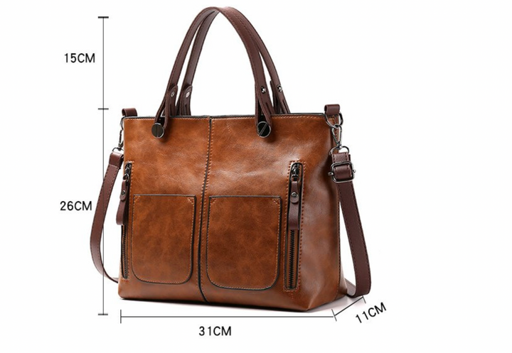 Bolso de mujer vintage elegante, cuero sintético. Ideal para looks clásicos y sofisticados.