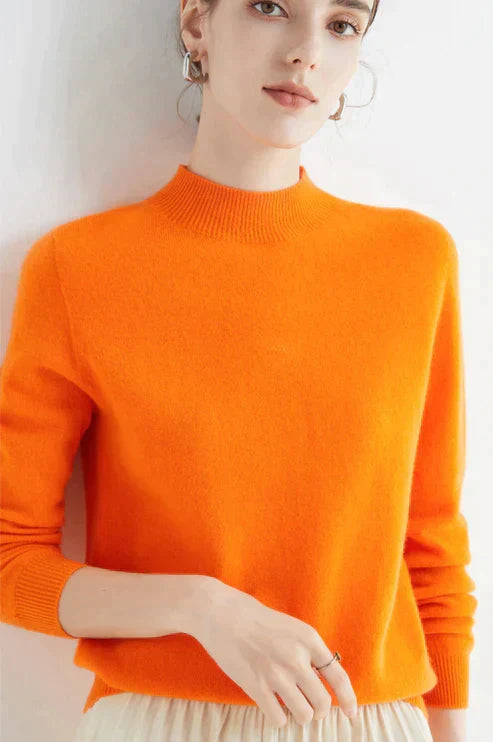 Suéter clásico de cuello alto para mujer. Elegancia y confort para otoño e invierno.