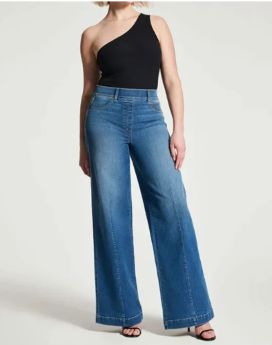 Jeans de pierna ancha para mujer, denim azul. Estilo relajado y chic, perfectos para un look casual y cómodo.