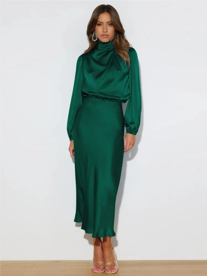 Vestido de mujer chic, corte midi, cuello alto y manga larga, ideal para eventos y reuniones.
