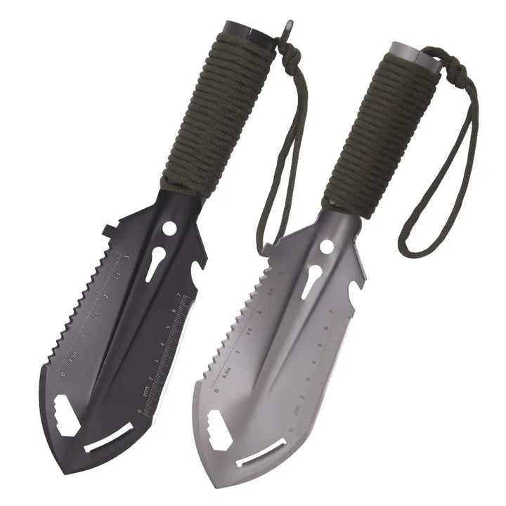 Herramienta pala compacta de supervivencia. Multifuncional y portátil para camping, senderismo y aventura al aire libre.