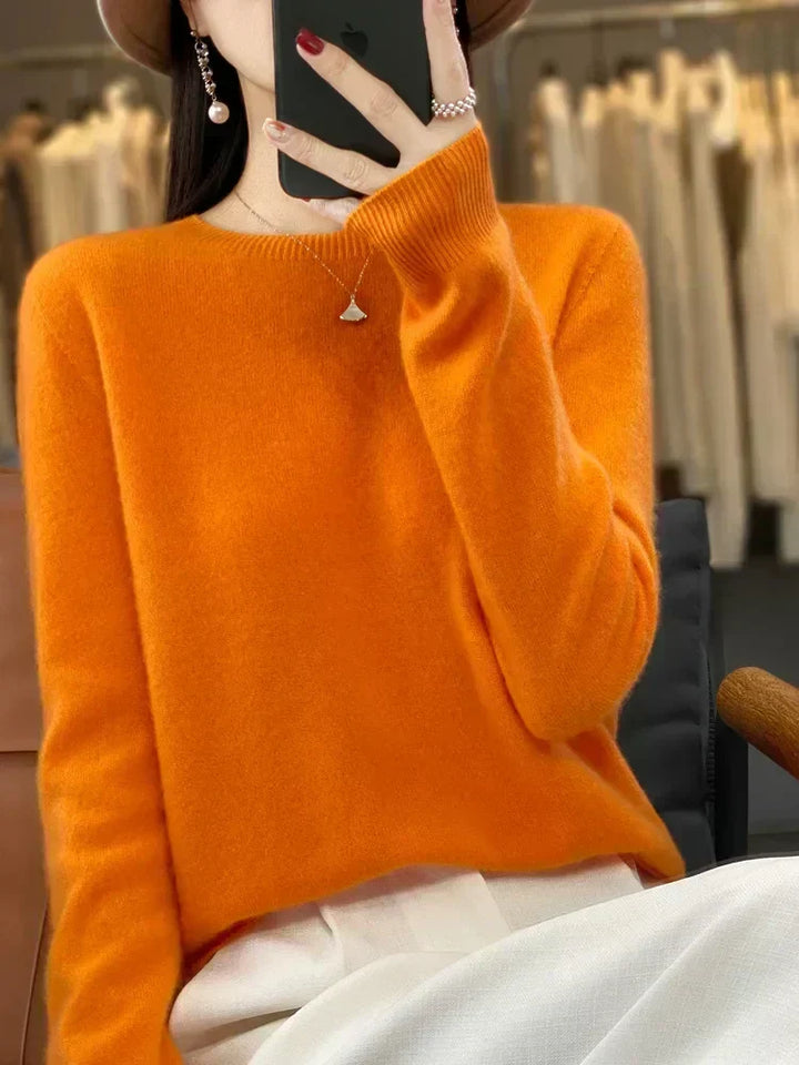 Suéter elegante para mujer, cuello redondo, tejido suave, moda de invierno actual.