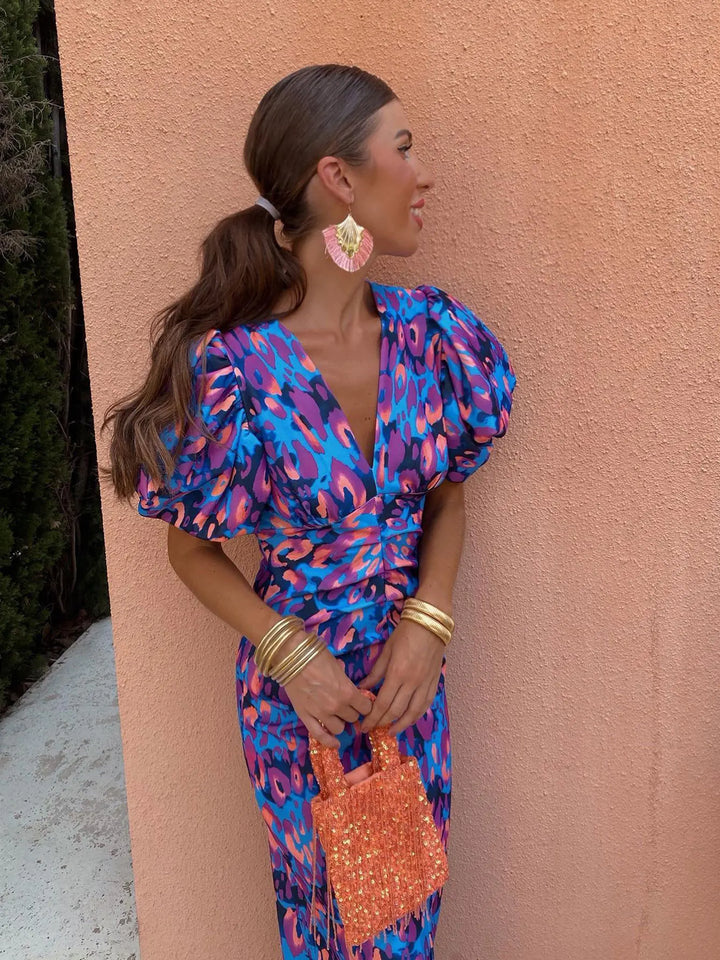 Vestido de primavera mujer, corte elegante con escote V y mangas abullonadas. Perfecto para ocasiones.