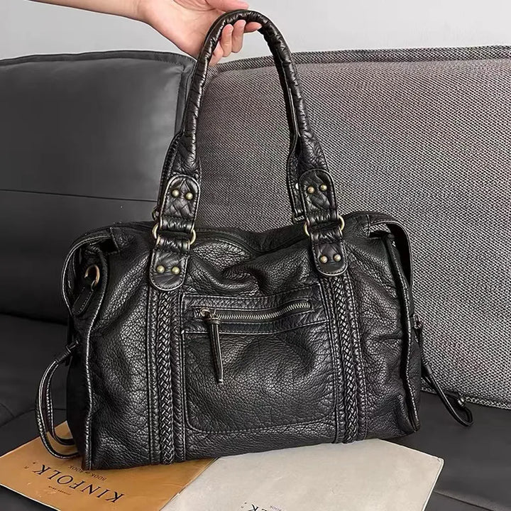 Bolso de mano negro casual para mujer, espacioso y funcional. Ideal para el día a día o clases.