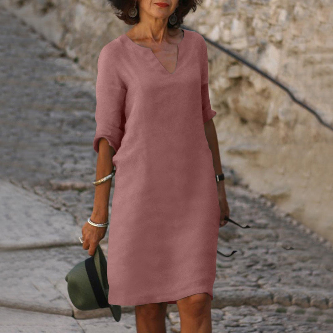Vestido midi de verano elegante estilo Iris para mujer, ideal para ropa casual o playa.