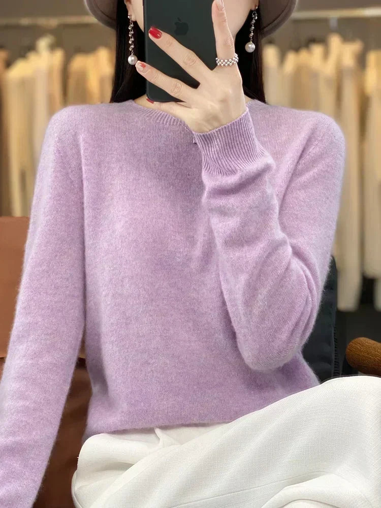Suéter de punto suave para mujer, cuello redondo, versátil para looks casuales y formales.