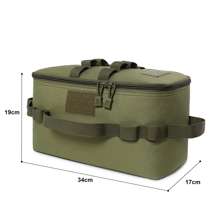 Detalle de los cierres y asas de la bolsa de almacenamiento para camping, ideal para un agarre cómodo y seguro.