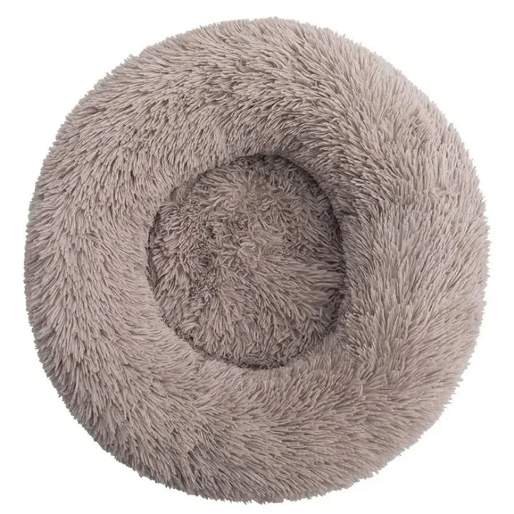 Mascotas relajadas: cama de peluche redonda, suave y confortable, para el descanso de tu perro o gato.