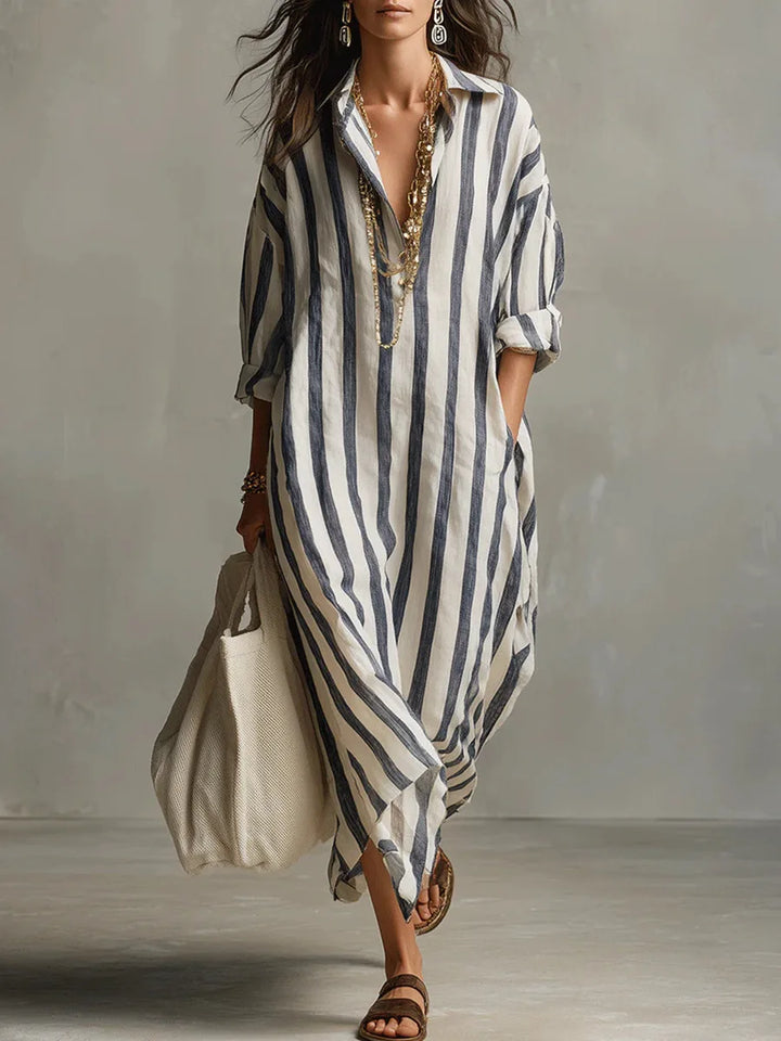 Vestido camisero largo de mujer, rayado fluido y elegante para verano.